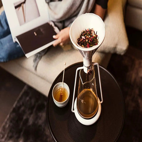 Elevate Your Daily Grind With This Dope 3-In-1 Coffee Kettle, Cold Brew And Ice Drip Maker, Manual Filter Teapot For Smooth Lattes And Cappuccinos, Matte Black Finish with tea brewing setup and honey.