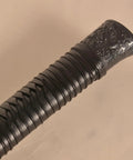 Close-up of handle on Tough As Nails Heavy Duty Polypropylene Practice Sword For Martial Arts One Piece Bokken Style Training Blade
