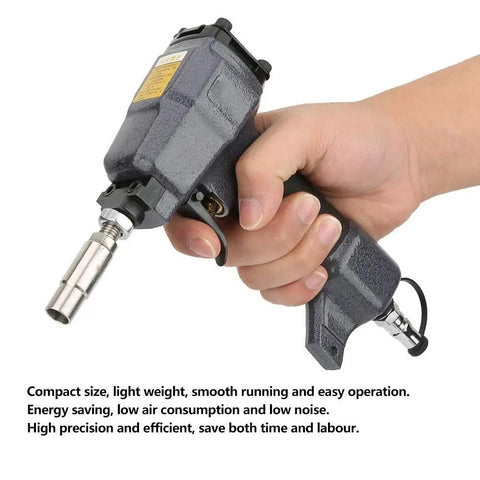 Hand holding lightweight pneumatic nail gun for trim and finish work, pin nailer for woodwork, air nail gun with durable metal build.