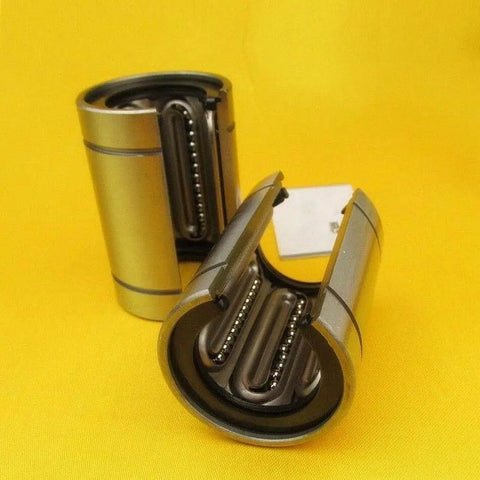 Open Linear Motion Bushing Bearing 12x21x30mm Two-Pack LM12UU-OP with rugged steel housing on yellow background