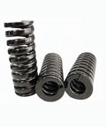 Heavy Duty Black Die Mold Compression Springs Made From Tough Alloy Steel For Industrial Stamping Projects With Exact 65mm Length And 20Mm Outer Diameter Fit, showing multiple springs stacked.