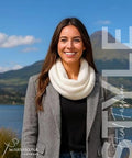 Woman wearing Ultra Cozy Winter Cashmere Infinity Scarf In Beige, Plush Soft Knit Wrap For Cold Weather, Premium Quality