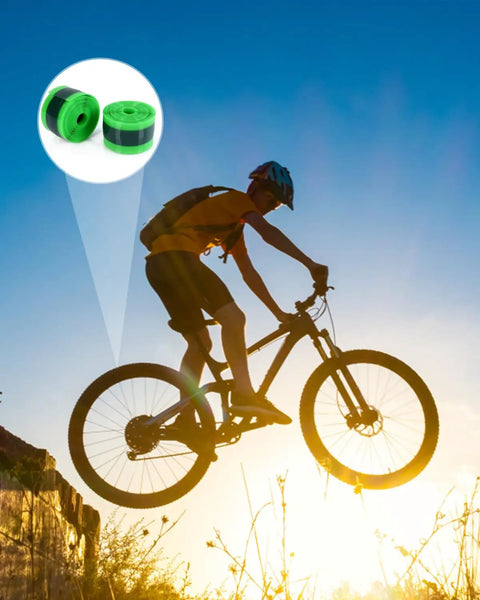 Silhouette of cyclist jumping at sunset with inset of Bike Tire Liner Inner Tube Flat Protector For 12in To 29in Wheels displayed.