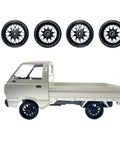 Drift Ready Rubber Tires And Thin Wheel Kit For D12 D42 RC Trucks, shown with black wheels on an RC truck.