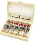 Kickin Out Flawless Holes With Zero Sweat From This Top Shelf Five Piece Forstner Drill Bit Set Featuring Adjustable Pilot Guide For Smooth Hinge Boring On Hardwood in wooden case.