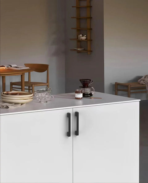 White cabinet featuring Six Pack 5 Inch Matte Black Kitchen Cabinet Pulls for Cupboards and Drawers, Zinc Alloy Handles