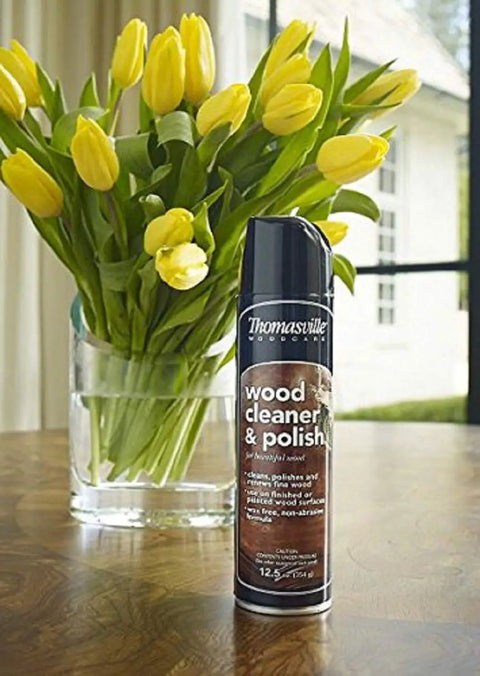 Wood Cleaner And Polish For All Surfaces Quick Shine Restorer Degreaser And Spot Cleaner can on table with tulips