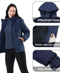 Woman wearing 3 In 1 Winter Ski Jacket With Fleece Liner, Waterproof Outer Shell And Windproof Inner Layer, showing hood and pocket details