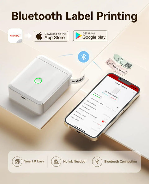 D110 Bluetooth Label Maker With Thermal Printer next to smartphone showing app, included tape, compact design for home office.