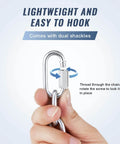 Hand holding zinc-plated shackle from Grade 30 Chain Quarter Inch By 100 Feet Zinc Plated Proof Coil Chain For Towing Logging Agriculture And Guard Rails