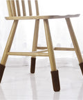 32 Pack Coffee Colored Furniture Leg Socks With Double Thick Elastic Covers on chair legs, non-slip and noise-reducing on hardwood floor.
