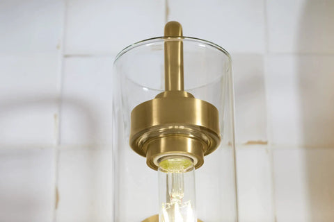 Purist 1 Light Sconce with rounded glass shade and tubular metal base, modern wall lighting for damp areas, E26 bulb required