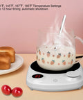 This Solid Electric Mug Warmer Boasts Four Heat Presets To Keep Your Daily Brew Piping Hot All Day Long Featuring Smart Auto Shut Off Protection And Fast Heating With A Sleek White Top For Desk Setup, showing mug with milk.