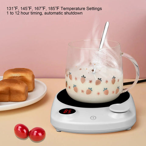This Solid Electric Mug Warmer Boasts Four Heat Presets To Keep Your Daily Brew Piping Hot All Day Long Featuring Smart Auto Shut Off Protection And Fast Heating With A Sleek White Top For Desk Setup, showing mug with milk.