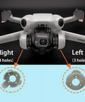 Close-up of DJI Mini 4 Pro drone with Replacement Rubber Gimbal Shock Absorbers showing right (4 holes) and left (3 holes) vibration dampers.