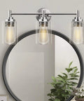 Three Light Matte Black Bathroom Vanity Lights With Clear Glass Shades Dope Over Mirror Modern Wall Sconce with round mirror.