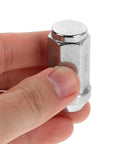 Chrome Plated Steel Wheel Lug Nuts For Rv And Car Hubs Super Easy Install Closed End Replacement Kit With Polished Stylish Finish To Upgrade Ride Style, chrome lug nut close-up in hand