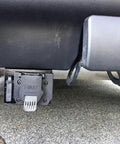 No Sweat Four Pin To Seven Pin RV Trailer Wiring Adapter With Dual Output Flat Harness mounted on truck hitch.