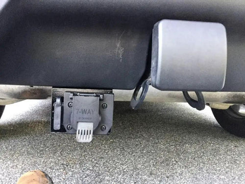 No Sweat Four Pin To Seven Pin RV Trailer Wiring Adapter With Dual Output Flat Harness mounted on truck hitch.