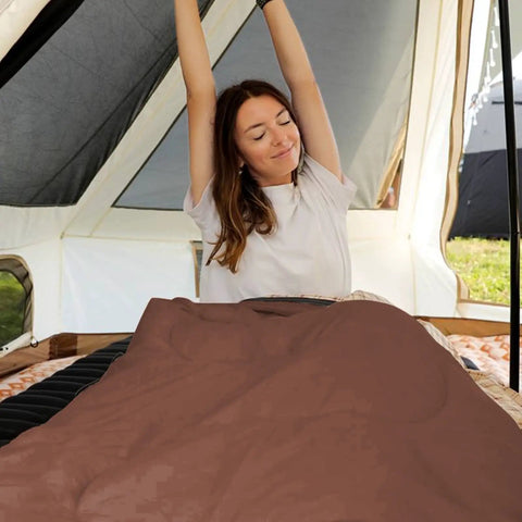 Person waking up comfortably in XL Big And Tall Flannel Sleeping Bag For Adults Cold Weather Cozy Warmth With Plush Cloud Like Liner.