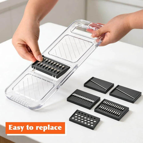 Front view of clear plastic mandoline slicer with stainless steel blades and safety hand guard
