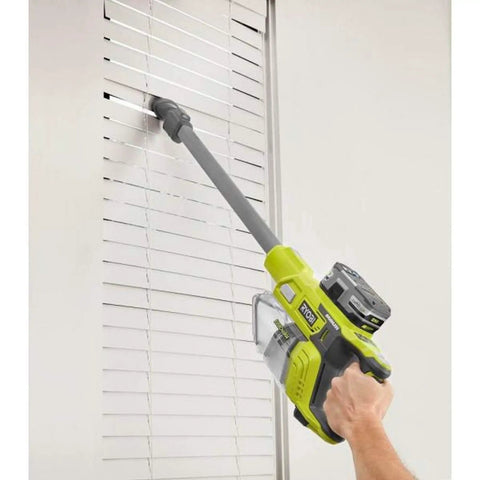 18V Brushless Cordless Compact Stick Vacuum Cleaner bare tool cleaning window blinds with extension wand.