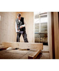 Man using Beast 1300W Hammer Drill With Impulse Mode For Damaged Screw Removal And Spot Drilling in construction site