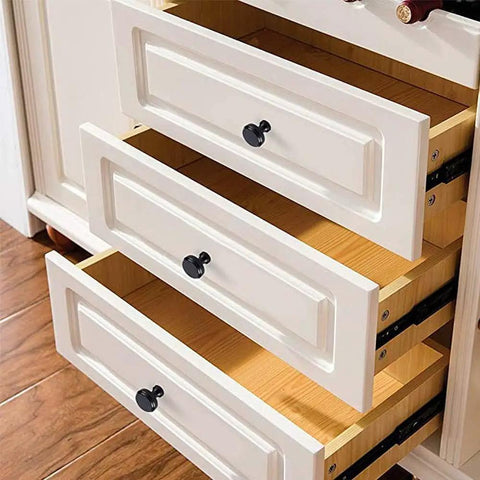 Black Cabinet Knobs, 6 Pack, 1-1/4 Inch Round Single Hole Drawer Knobs For Dresser And Kitchen Cabinets installed on white drawers