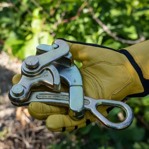 Gloved hand holding Haven's Grip Wire Pulling Tool For Wire Rope Up To 0.75 Inch, Heavy Duty 8000-Pound Max Load outdoors