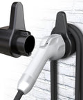 Super Tuff EV Charger Holder Wall Mount Keeps Your J1772 Nozzle And Cables Tucked In Tight So You Never Trip Over Your Gear When Plugging In Your Electric Ride With Zero Hassle. Image of a wall mount holder with J1772 nozzle and charging cable.