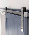 Six Feet Brushed Nickel Sliding Barn Door Hardware Kit for 36 Inch Door installed with smooth quiet track system on blue door