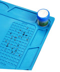 Top Notch Silicone Repair Mat With Heat Resistant Non Slip Surface And Precision Pin Layout For Soldering Stations Laminating Machines And No Sweat Tech Fixes showing blue silicone mat with organized screws and small container.