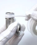Person handling 2 Pack Stainless Steel 304 90 Degree Elbow Fittings, 3/4 NPT Threaded, with tape for plumbing installation