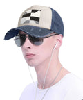 Unisex Adjustable Cotton Baseball Cap With Classic Black And White Piano Grid Pattern worn by a model with sunglasses and headphones.