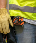 Heavy Duty Pro-Grade 16-Foot Tape Measure With Single Hook Nylon Reinforced Blade And Metal Belt Clip in use on a job site