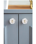 Set Of 6 Crystal Flower Cabinet Knobs In Daisy White installed on gray cabinet, glass drawer pulls for chic and sparkling decor
