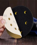 Huge 150 Pack Of 5 Inch Hook And Loop Sanding Discs With 40 To 800 Grit Range Made From Durable Aluminum Oxide shown in use.