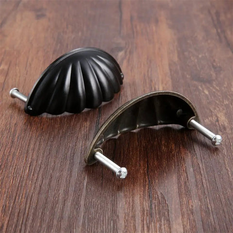 One Piece Zinc Alloy Kitchen Drawer Cabinet Door Handle Knob With Antique Bronze And Black Finish on wooden surface