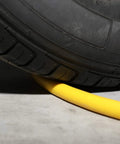 Three Eighth Inch Lead In Air Hose Six Feet Long With One Quarter NPT Quick Coupler And Plug 300 PSI Yellow Whip Compressor Hose Short under a tire