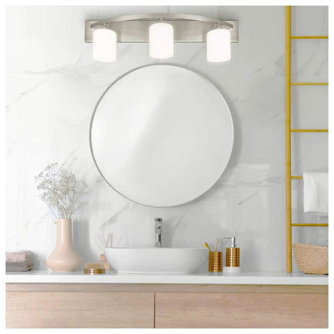 Modern Three Light Bathroom Vanity Light Fixture In Brushed Nickel With Glass Globes Reversible Mounting Up Or Down For Bathrooms Dressing Tables Mirror Cabinets And Art Displays installed above round mirror