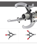Heavy Duty Hydraulic Three Claw Puller Knocking Out Stubborn Bearings With Zero Sweat For Auto Mechanic Crews Up To Fifty Tons Of Raw Pulling Power For Heavy Workshop Jobs close-up showing claws and center grip detail