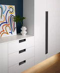Black Hidden Cabinet Drawer Pulls Handle Concealed Aluminum Alloy Pull For Cabinets And Sliding Doors, installed on white furniture