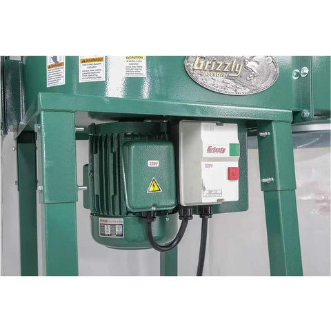 Close-up of motor and control box on Shop Tough Five Horsepower Industrial Dust Collector Kicking Serious Dust With Giant Fifteen Inch Impeller.