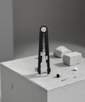 Pro Grade Watch Band Removal Tool Kit With 8 Pins, Heavy Duty Metal Spring Bar Tool, adjustable in front of gray background