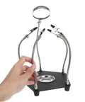 Hand holding Magnetic Third Hand Soldering Aid With Built In Magnifier for craft and PCB work, pro grade stainless steel tool.