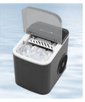 No Fuss Portable Countertop Ice Maker With Sturdy Carry Handle And Easy Self Cleaning Cycle Fast Freeze Compact Ice Machine with ice in view.