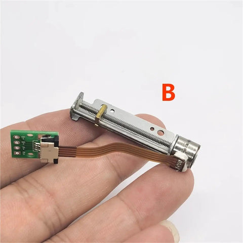 Badass Mini Linear Actuator DC Stepper Motor With Driver Board 29Mm Stroke 5V 6V showing detailed control board and screw shaft.
