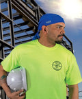 Worker wearing blue cooling bandana sweat wicking skull cap under helmet adjustable 2-pack elastic band performance fabric