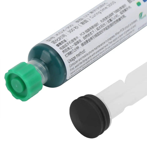 Close-up of green solder resist ink tube with cap, part of Liquid Solder Paste For Electronics, Solder Mask Ink Flux Paste With UV Light Curing.