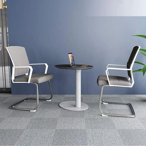 Heavy Duty Pneumatic Lectern With Smooth Height Adjustment Mobile Presentation Podium Built Like A Tank No Sweat Setup Rock Solid Base Perfect For Churches Offices Classrooms Straight Up Reliable meeting setup with two stylish gray chairs and a black round table.